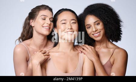 Women, faces diversity or skincare glow on studio background in healthcare wellness, self love empowerment or community support. Portrait, smile or Stock Photo