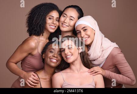 Women, faces or diversity on studio background in empowerment trust, solidarity support or community self love. Portrait, smile or group beauty models Stock Photo