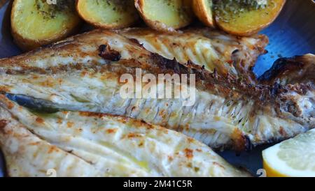 grilled sea bream with potatoes Stock Photo