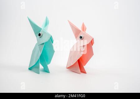 Lime Green Rabbit pastel green paper origami hare rabbit with googly eyes isolated on a ...