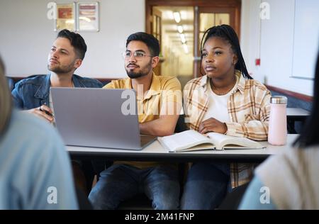 Students, diversity or laptop in school classroom, lecture or lesson on college, university or education campus. Men, black woman or study people with Stock Photo
