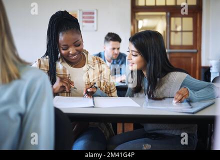 Education, teamwork or students in classroom for working together on university, college or school research project. Diversity, smile or happy friends Stock Photo