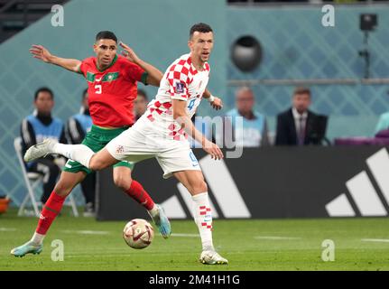 DOHA, QATAR - DECEMBER 17: Ivan Perisic of Croatia competes for the ball with Achraf Hakimi of Morocco ,during the FIFA World Cup Qatar 2022 3rd Place match between Croatia and Morocco at Khalifa International Stadium on December 17, 2022 in Doha, Qatar. (Photo by MB Media) Stock Photo