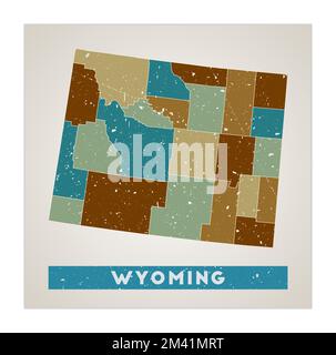 Wyoming map. Us state poster with regions. Old grunge texture. Shape of Wyoming with us state name. Artistic vector illustration. Stock Vector