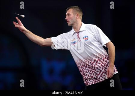 Madars Razma during his match against Prakash Jiwa during day four of the Cazoo World Darts Championship at Alexandra Palace, London. Picture date: Sunday December 18, 2022. Stock Photo