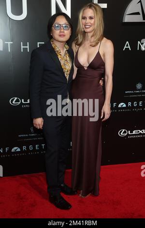 Jimmy O. Yang and Brianne Kimmel arrive at a red carpet event for