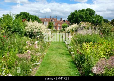 Summer Landscape view of  herbaceous borders in Helmingham Hall and Gardens Suffolk Stock Photo