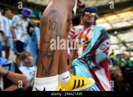 Argentina's Lionel Messi features as a tattoo on a fans calf ahead of ...