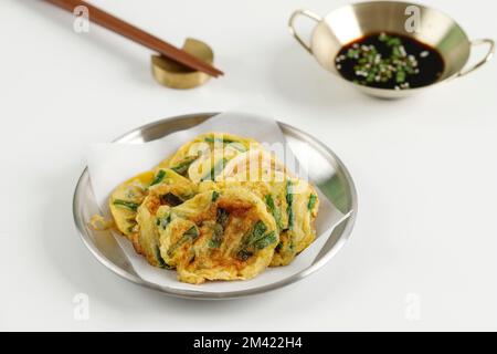 Homemade Korean Pajeon Scallion Pancakes with Soy Sauce and Sesame Seed on a White Table. Asian Food. Stock Photo