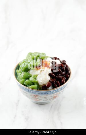Malaysian Desserts Called Cendol .Cendol is Made From Crushed Ice Cubes, Red Bean, or Fruit Stock Photo