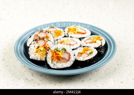 Korean Roll Gimbap or Kimbob, Made from Steamed White Rice Bap with Vegetable, Meat, and Various Other Ingredients Stock Photo