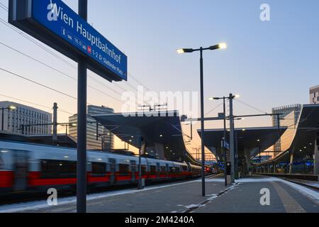 Vienna central railway station Hauptbahnhof, at evening with train platforms. Wien, Austria, transport, transportation. Stock Photo