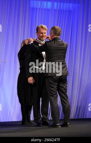 Jarosław Sellin (right) awards singer Tomasz Konieczny (left) by gold medal for Merit to Culture – Gloria Artis for his 25-years carrer Stock Photo