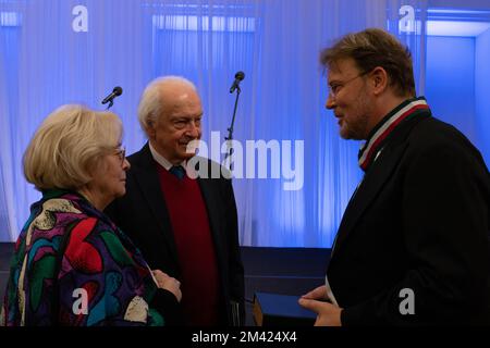 Antoni Wit (center), his wife (left) congratulate Tomasz Konieczny ...