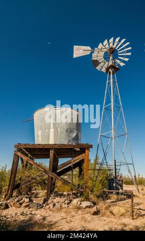 Windmill, water tank, Bates Well Ranch, El Camino del Diablo, Organ Pipe Cactus National Monument, Arizona, USA Stock Photo