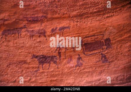 Neolithic rock painting from the pastoral period at the site of Sefar, Tassili N'Ajjer, South Algeria, Sahara desert. Stock Photo