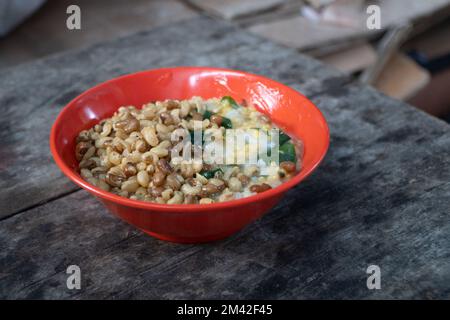 Porridge Ledok is one of the special foods from Nusa Penida Island, Bali. In addition to its delicious taste, this porridge also provides health benef Stock Photo