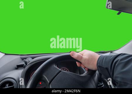 Hand on a car steering wheel. Maneuver on car, make a sharp left turn. Green screen. copy space Stock Photo