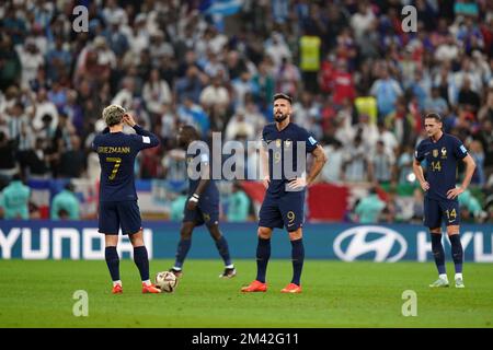 France's Antoine Griezmann, Olivier Giroud and Adrien Rabiot stand dejected after conceding the second goal scored by Argentina's Angel Di Maria (not pictured) during the FIFA World Cup final at Lusail Stadium, Qatar. Picture date: Sunday December 18, 2022. Stock Photo