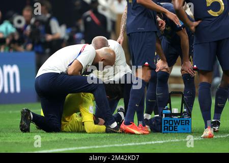 LUSAIL CITY, QATAR - DECEMBER 18: Goalkeeper Hugo Lloris of France reacts as he lies injured during the FIFA World Cup Qatar 2022 Final match between Argentina and France at Lusail Stadium on December 18, 2022 in Lusail City, Qatar. Photo: Goran Stanzl/PIXSELL Stock Photo