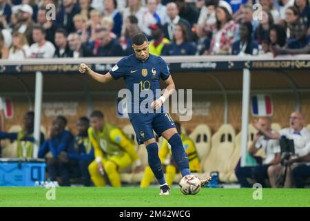 LUSAIL, QATAR - DECEMBER 18: Player of France Kylian Mbappé passes the ball during the FIFA World Cup Qatar 2022 Final match between Argentina and France at Lusail Stadium on December 18, 2022 in Lusail, Qatar. (Photo by Florencia Tan Jun/PxImages) Credit: Px Images/Alamy Live News Stock Photo