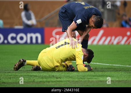 Lusaier, Qatar. 18th Dec, 2022. Hugo Lloris (below), goalkeeper of France, reacts during the Final between Argentina and France at the 2022 FIFA World Cup at Lusail Stadium in Lusail, Qatar, Dec. 18, 2022. Credit: Li Ga/Xinhua/Alamy Live News/Alamy Live News Stock Photo