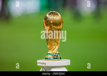 Doha, Qatar. 18th Dec, 2022. The FIFA World Cup Trophy is displayed on the pitch at the Qatar 2022 World Cup Final between Argentina and France at Lusail Stadium in Lusail, north of Doha, on December 18, 2022. (Photo: William Volcov) Credit: Brazil Photo Press/Alamy Live News Stock Photo