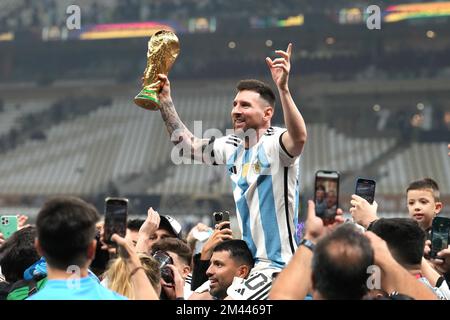 Argentina captain Lionel Messi celebrate with the FIFA World Cup Trophy