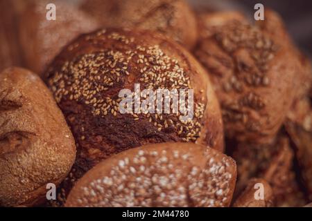 Mixed fresh bread and buns closeup. gluten-free pastries. Stock Photo