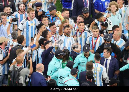 Lusail, Qatar. 18th Dec, 2022. Sergio Aguero Argentine legend celebrates with trophy during the Final of the FIFA World Cup Qatar 2022 between Argentina and France at Lusail Stadium, Lusail, Qatar on 18 December 2022. Photo by Peter Dovgan. Editorial use only, license required for commercial use. No use in betting, games or a single club/league/player publications. Credit: UK Sports Pics Ltd/Alamy Live News Stock Photo