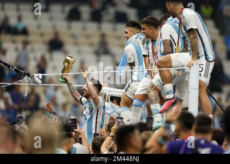 Lusail, Qatar. 18th Dec, 2022. Players of Argentina celebrate after the awarding ceremony of the 2022 FIFA World Cup at Lusail Stadium in Lusail, Qatar, Dec. 18, 2022. Credit: Wang Lili/Xinhua/Alamy Live News Stock Photo