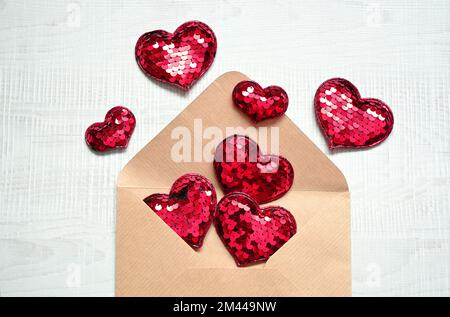 Envelope and red hearts on white background. Valentine's day, love, anniversary concept Stock Photo