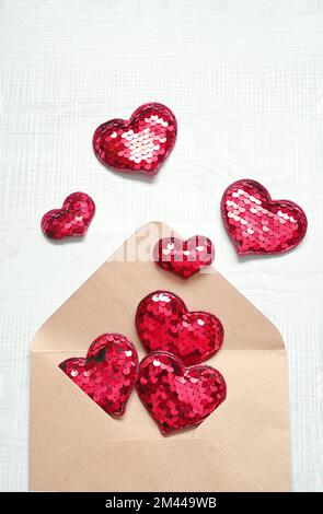 Envelope and red hearts on white background. Valentine's day, love, anniversary concept Stock Photo