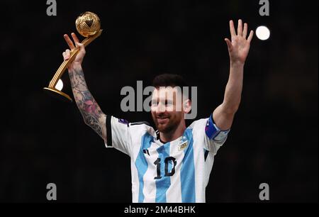 Doha, Qatar, 18th December 2022.  Lionel Messi of Argentina with the player of the tournament trophy during the FIFA World Cup 2022 match at Lusail Stadium, Doha. Picture credit should read: David Klein / Sportimage Stock Photo