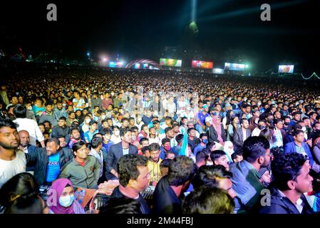 Bangladeshi soccer fans watch on a big screen a public broadcast of the FIFA World Cup Qatar 2022 match between Argentina and France final Match at the Dhaka University Campus, in Dhaka, Bangladesh, on December18, 2022. Stock Photo