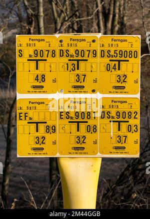 Signs pointing to utilities, long-distance gas pipelines, and pipelines such as underground hydrants or gate valves of water supply, sewage disposal, Stock Photo