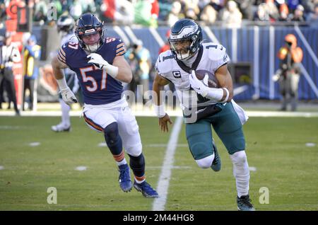 Chicago, IL, USA. 18th Dec, 2022. Chicago Bears quarterback #1 Justin Fields  is sacked by Eagles #94 Josh Sweat during a game against the Philadelphia  Eagles in Chicago, IL. Mike Wulf/CSM/Alamy Live