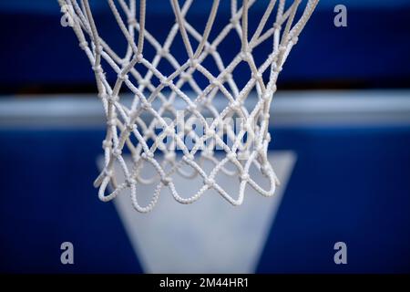 Basketball net isolated on blue background. Professional sport concept. Horizontal sport poster, greeting cards, headers, website Stock Photo