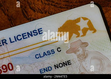 Lake Elsinore, California, USA - Dec 18, 2022: Closeup of California Real ID driver license focusing on the REAL ID logo Stock Photo