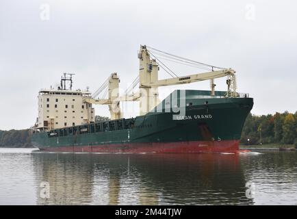 Cargo ship Ocean Grand sails through the Kiel Canal, Schleswig-Holstein, Germany Stock Photo