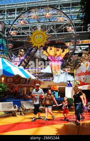 A Family Enjoys the Indoor Nickelodeon Amusement Park at the Mall of America in Minnesota Stock Photo