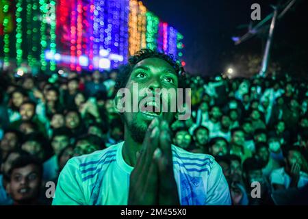 Dhaka, Bangladesh. 18th Dec, 2022. Argentinian supporter reacts as they watch the final football match of the Qatar 2022 World Cup between Argentina and France at the University of Dhaka area in Dhaka. Credit: SOPA Images Limited/Alamy Live News Stock Photo