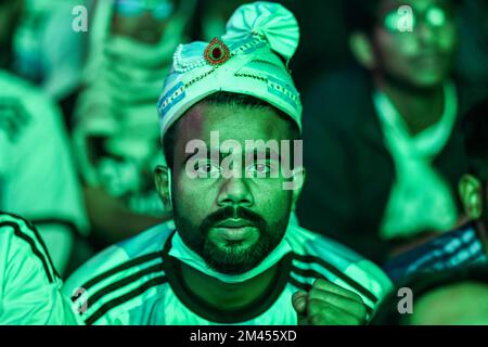 Dhaka, Bangladesh. 18th Dec, 2022. Football fan watches the FIFA World Cup Qatar 2022 final match between Argentina and France on a big screen, at the University of Dhaka area in Dhaka. Credit: SOPA Images Limited/Alamy Live News Stock Photo