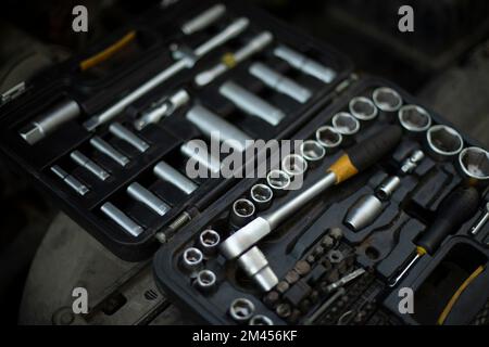 Tool in drawer. Car repairs. Wrenches and nuts. Steel tool kit. Chrome-plated steel and drawer. Stock Photo