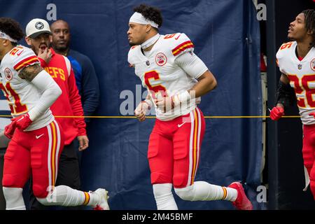 Kansas City Chiefs safety Bryan Cook passes the ball during NFL