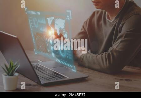 Businessman use laptop for analyze and management data to succeed on virtual screen. Stock Photo