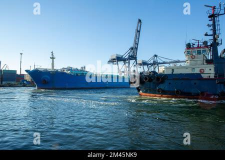 bulk carrier vessel is sailing in the port area. Bulk carrier after accident in bow Stock Photo