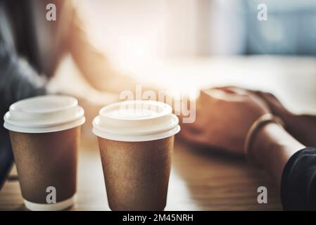 I just needed to offload. Closeup shot of two women holding hands. Stock Photo