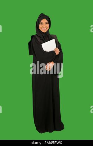 Portrait of arab businesswoman holding laptop. Stock Photo