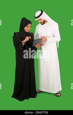 Arab couple using digital tablet. Stock Photo